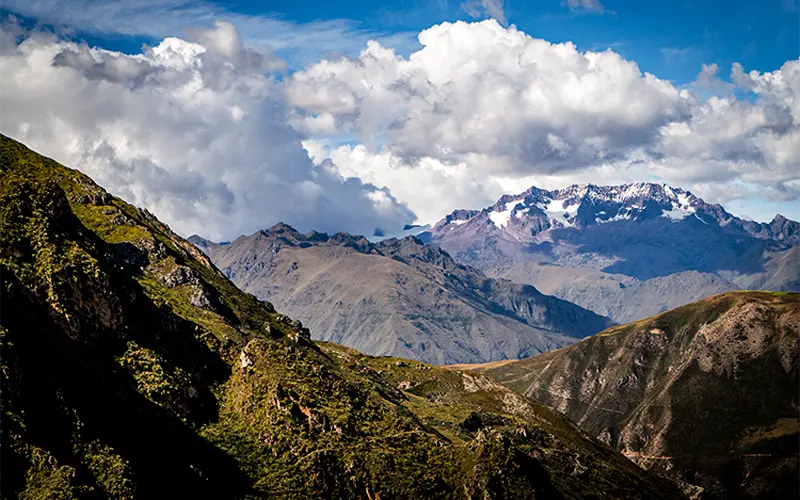 Wide view of valley and glacier seen from mountain section of Perolniyoc route (Peru Biking Tours)